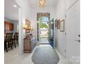 Welcoming foyer with an open view of the home's interior and a stylish rug at 26444 Sandpiper Ct, Fort Mill, SC 29707
