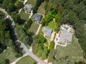 An aerial view showing property lines, home, neighborhood, and surrounding trees at 3735 Gordon St, Terrell, NC 28682