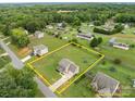 Expansive property featuring a well-maintained yard and highlighted boundary lines surrounded by mature trees at 5668 Stanfield Ridge Dr, Stanfield, NC 28163