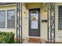 Close-up of the front door with a decorative wreath and 'Welcome' mat at 1425 3Rd Street Ne Pl # 9-10, Hickory, NC 28601