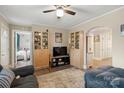 Spacious living room featuring hardwood floors, built-in shelving, and ample natural light at 1425 3Rd Street Ne Pl # 9-10, Hickory, NC 28601