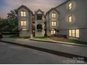 A three story condo with well-maintained siding, lit balconies and easy access from the sidewalk at 18817 Nautical Dr # 302, Cornelius, NC 28031