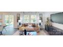 Comfortable living room boasts large windows, neutral color palette, and modern furnishings for relaxation at 3090 Ora Smith Rd, Lincolnton, NC 28092