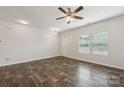 Spacious living room with hardwood floors, bright lighting, and neutral paint for modern elegance at 3107 Riker St, Clover, SC 29710