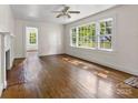 Inviting living area with large windows, natural light, and wood floors at 505 Franklin Ave, Shelby, NC 28150