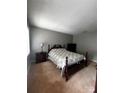 Comfortable bedroom with neutral walls, carpeted floor, and classic furnishings at 1300 Larchmont Pl, Salisbury, NC 28144