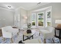 Welcoming living room with a bay window, hardwood floors, neutral paint and an open doorway at 8304 Prescott Glen Pkwy, Waxhaw, NC 28173