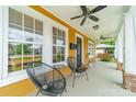 Spacious porch with chairs and ceiling fans, perfect for relaxing outdoors at 904 Anderson St, Charlotte, NC 28205