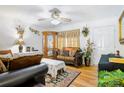 Elegant living room with hardwood floors, curated decor and large windows at 1116 Crestview Dr, Salisbury, NC 28146