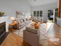 Bright living room features vaulted ceilings, fireplace, and neutral decor at 1573 Maypine Commons Way, Rock Hill, SC 29732