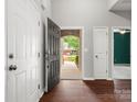 Welcoming foyer with hardwood floors and a view into the living space with great natural light at 1660 Beleek Ridge Ln, Lake Wylie, SC 29710