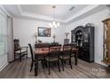 Elegant dining room featuring a classic dining set and sophisticated decor at 250 Winford Rd, Troutman, NC 28166