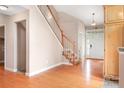 Bright entryway with hardwood floors, staircase, and natural light at 2695 Queens Rd, Lincolnton, NC 28092