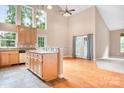 Open kitchen featuring an island with granite countertops and stainless steel appliances at 2695 Queens Rd, Lincolnton, NC 28092