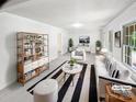 Bright living room with neutral tones, modern furnishings, and stylish decor at 302 Melinda Ave, Kannapolis, NC 28083
