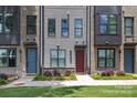 Charming townhome exteriors showcasing architectural details and colorful doors at 5006 Tiny Ln, Charlotte, NC 28203