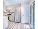 Modern kitchen with stainless steel appliances and sleek countertops at 7912 Charter Oak Ln, Charlotte, NC 28226