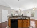 Kitchen features a stainless steel sink at 10446 Trolley Run Dr, Cornelius, NC 28031