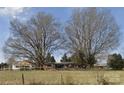 Charming home with mature trees on a lush green lawn at 2808 Water Plant Rd, Maiden, NC 28650