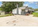 Exterior showcasing a nice yard, back entrance, and convenient off-street parking at 403 Weaver St, Cherryville, NC 28021