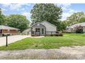 Quaint single-story home with a well-manicured lawn and inviting front porch at 403 Weaver St, Cherryville, NC 28021