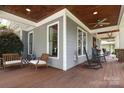 Inviting outdoor porch featuring comfortable seating and views of the surrounding landscape at 3237 Sunset Dr, Charlotte, NC 28209