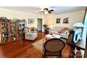 Cozy living room featuring hardwood floors, neutral furniture, and bright lighting at 3810 Biggers Rd, York, SC 29745