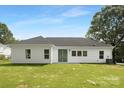 The home's backyard features a well-manicured lawn, providing a perfect outdoor space for entertainment and relaxation at 1312 W Monroe Rd, Salisbury, NC 28144