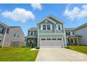 Charming two-story home with a two-car garage, lush lawn, and inviting curb appeal at 133 Aspire Cir, Wingate, NC 28174