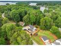 Scenic aerial view of the property nestled among lush trees, showcasing a tranquil, private setting at 136 Digh Cir # 4, Mooresville, NC 28117