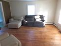 Bright living room with hardwood floors and comfortable seating at 209 14Th Se Ave, Hickory, NC 28602