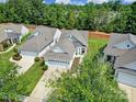 Aerial view of the residential community showing the home's landscaping and proximity to nearby homes at 21214 W Tern Ct, Fort Mill, SC 29707