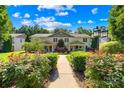 Charming townhouse with a well-manicured lawn, beautiful landscaping, and inviting walkway at 49009 Dockside Ln # D, Albemarle, NC 28001