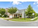Attractive home exterior with a manicured lawn, mature trees, and a welcoming entrance at 867 Pecan Tree Ln, Fort Mill, SC 29715