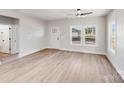 Bright living room featuring lots of natural light, hardwood floors, and an elegant door at 1407 7Th St # 4, Statesville, NC 28677
