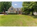 Beautiful exterior view of this well-maintained home with a lush front yard and inviting curb appeal at 1530 Danlee Dr, Lancaster, SC 29720