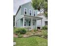 Attractive two-story home with a covered front porch and well-maintained landscaping, adding curb appeal at 15907 Rose Glenn Ln, Davidson, NC 28036