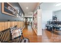Inviting entryway featuring hardwood floors, custom wall paneling, and stylish decor at 261 Catoctin Rd, Rock Hill, SC 29732