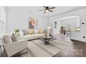 Bright living room with modern decor, stylish furnishings, and an open concept design at 3153 Bending Birch Pl, Charlotte, NC 28206