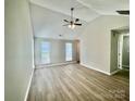 Bright, open room with wood-look floors, and natural light at 5800 Silver Eagle Dr, Charlotte, NC 28214