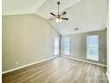 Spacious bedroom with vaulted ceiling, fan, and lots of natural light at 5800 Silver Eagle Dr, Charlotte, NC 28214