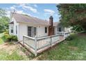 A spacious backyard with a wooden deck perfect for outdoor entertaining at 137 Citation Dr, Mooresville, NC 28117
