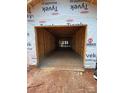 Spacious unfinished two car garage with concrete floor and room for storage and vehicles at 2735 Primrose Ave, Charlotte, NC 28208