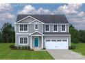 Inviting two-story home featuring gray siding, a lovely front door, and a convenient two-car garage at 10112 Florentine Ln, Charlotte, NC 28214