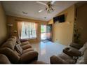 Open concept living area with tile floors, natural light, and comfortable seating at 501 N Johnson St, Monroe, NC 28112