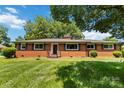 Attractive brick home with neat landscaping and classic appeal at 5111 Tewkesbury Rd, Charlotte, NC 28269