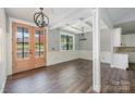Bright living room features coffered ceilings, hardwood floors, and lots of natural light at 129 John Smith Rd, York, SC 29745