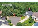 Aerial view of a landscaped property near the McAlpine Creek Greenway walking trail entrance at 2215 Henery Tuckers Ct, Charlotte, NC 28270