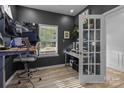 Functional office space with dual monitors, a window, and a comfortable chair at 229 Cramerton Mills Pkwy, Cramerton, NC 28032