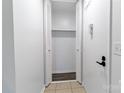 Hall closet with bi-fold doors and shelf offers storage space at 326 Orchard Trace Ln # 3, Charlotte, NC 28213